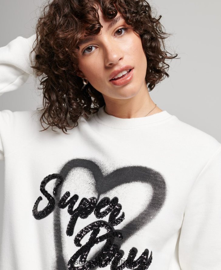 Superdry ženy zdobená posádková mikina 6B4ZTR2263 oblečenie biely